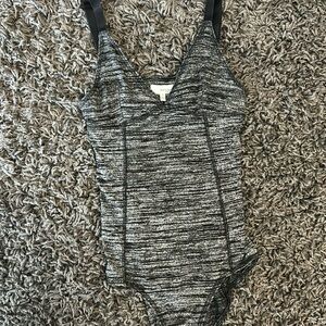 Wilfred Free (Aritzia) bodysuit in a grey/black marble color.
